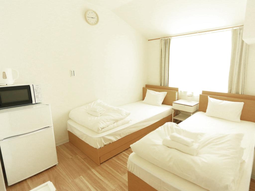 coins hostel tenjin