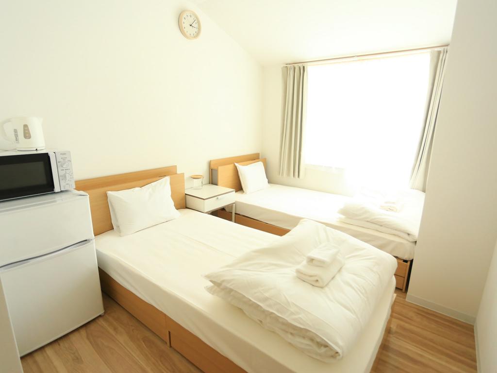 coins hostel tenjin