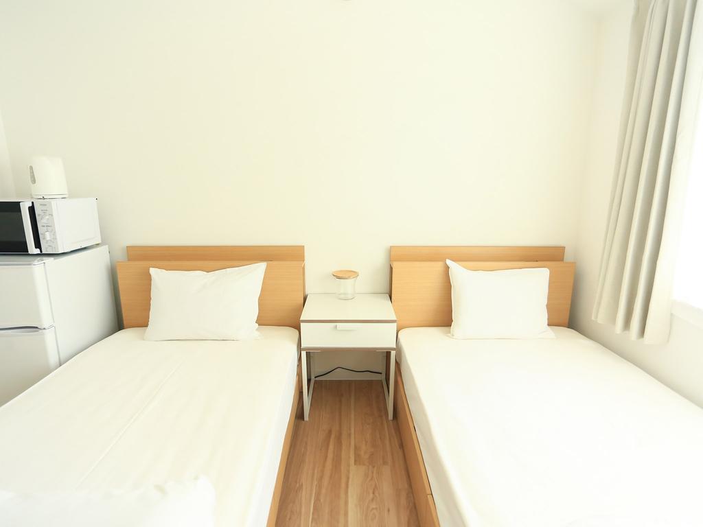 coins hostel tenjin